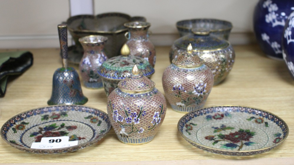 A collection of Chinese plique a jour ornaments including a bell